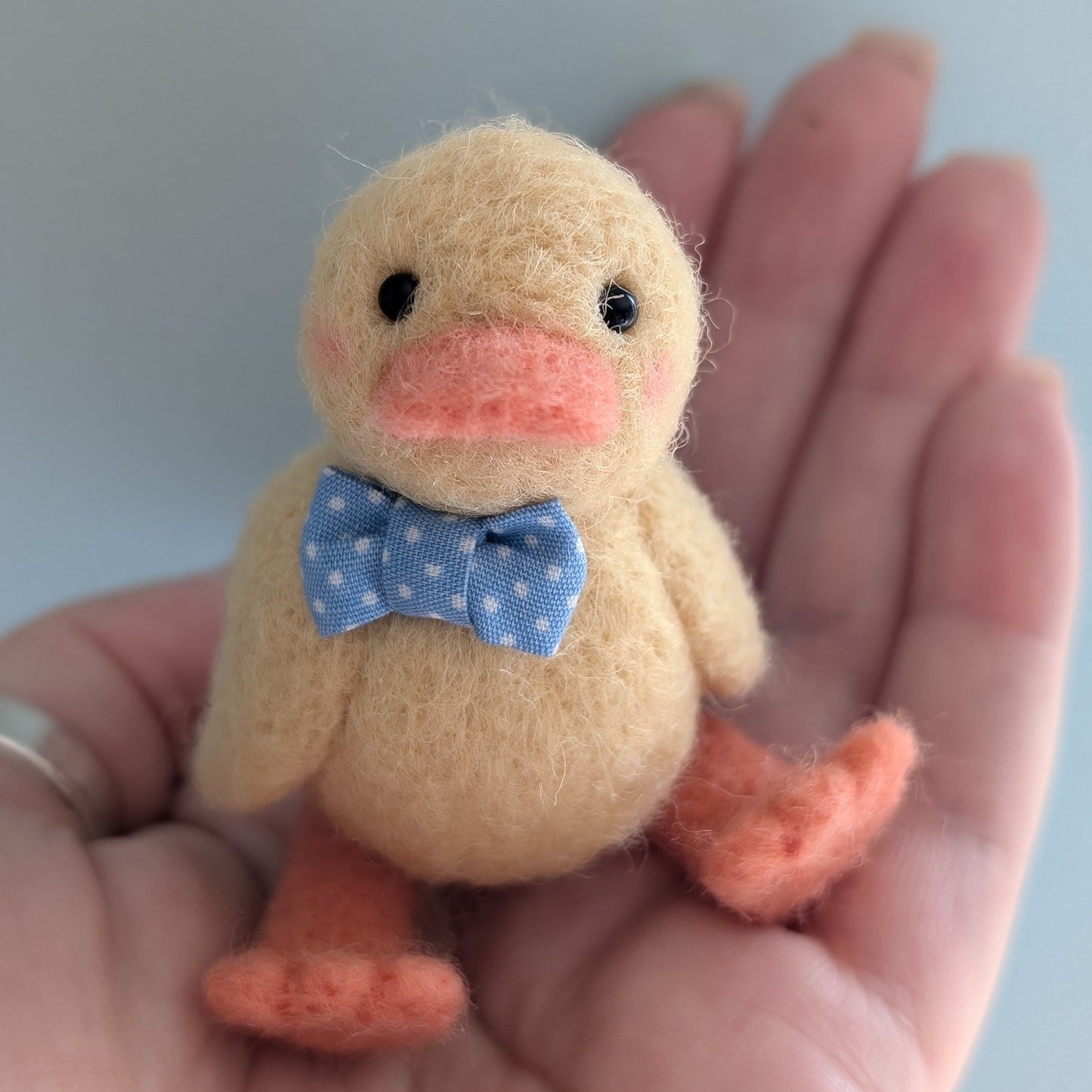 needlefelt yellow duckiling with a spotty bow tie