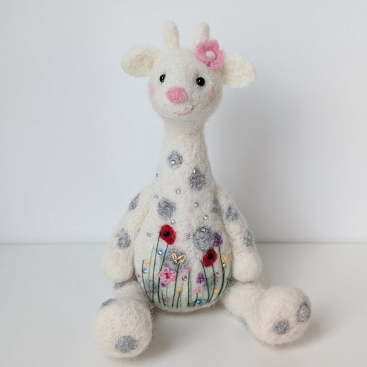Needlefelted giraffe with floral decoration